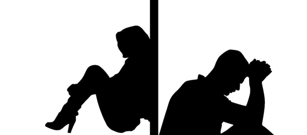 silhouette of divorcing spouses