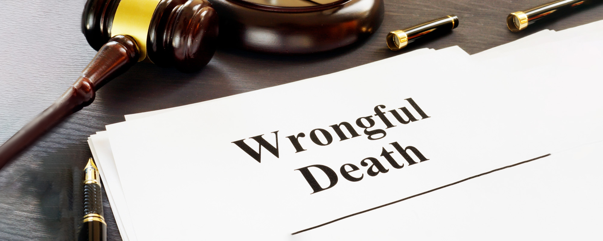 gavel with wrongful death documents