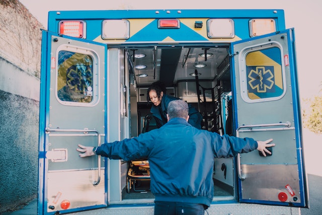 EMT opening ambulance door
